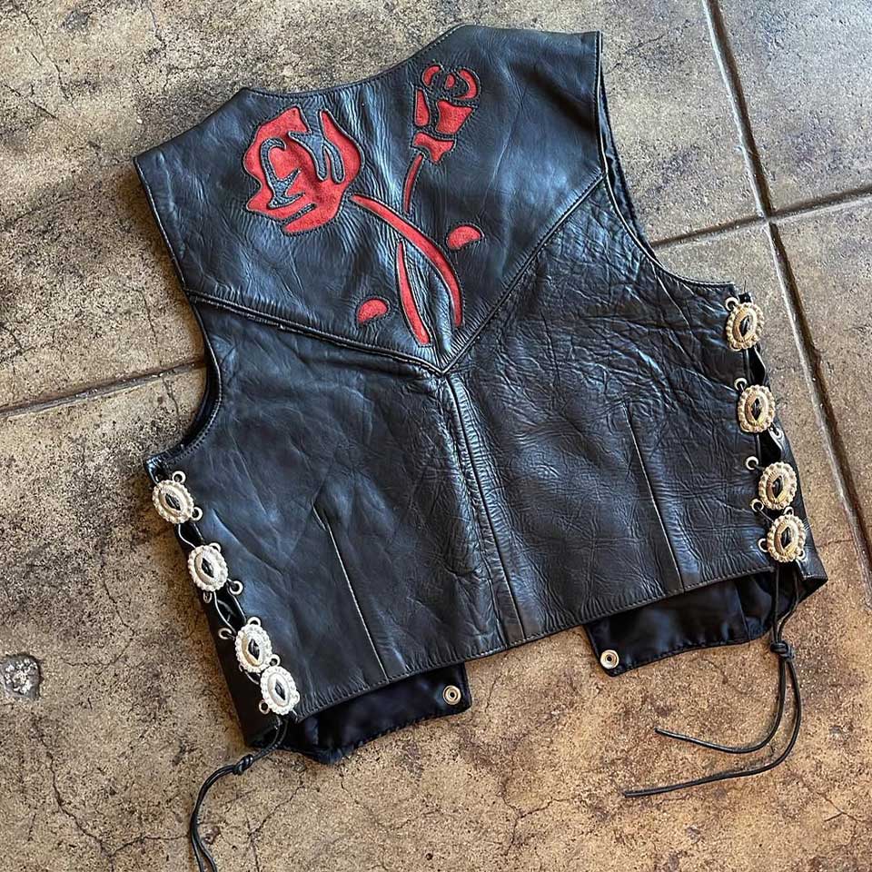 The Custom Cowhide Vest with Red Trim